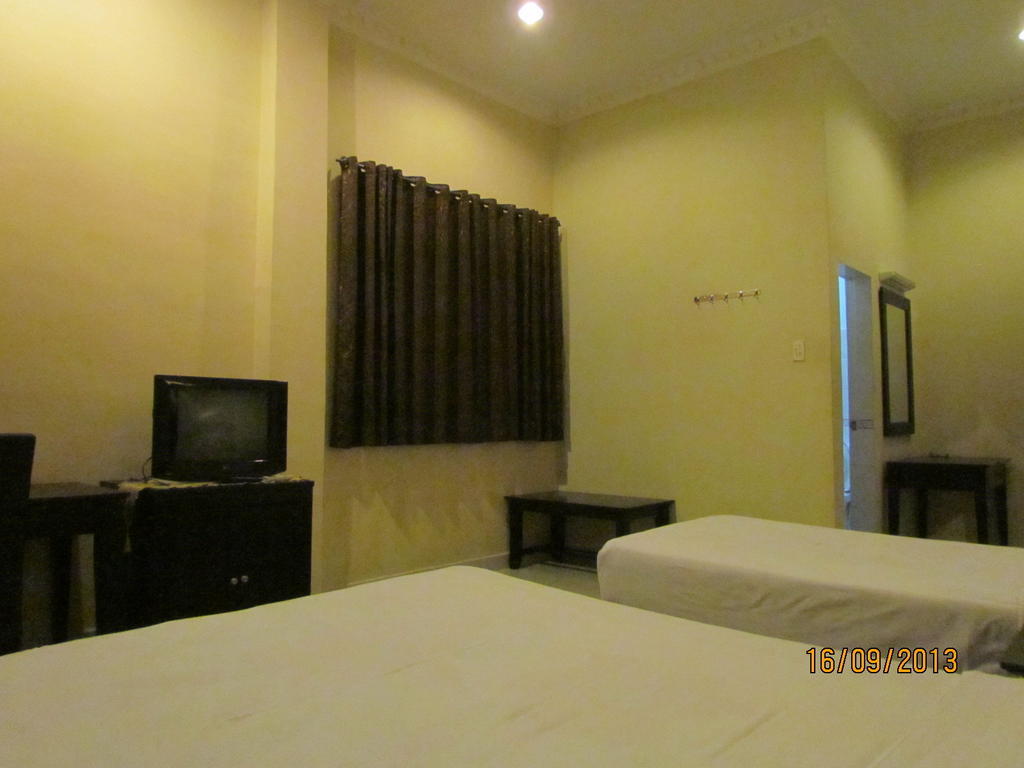 Carolina Transit Hotel Medan Phòng bức ảnh