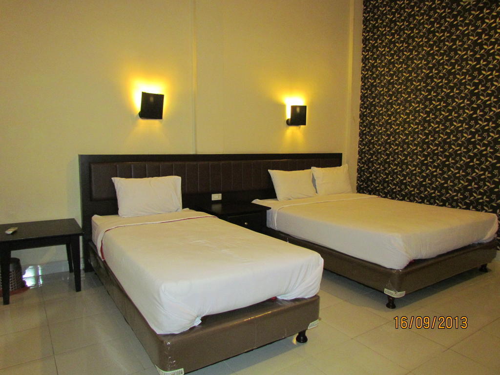 Carolina Transit Hotel Medan Phòng bức ảnh